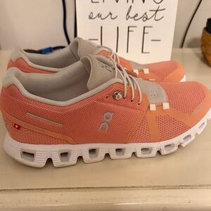 On Clouds Peach and White Sneakers